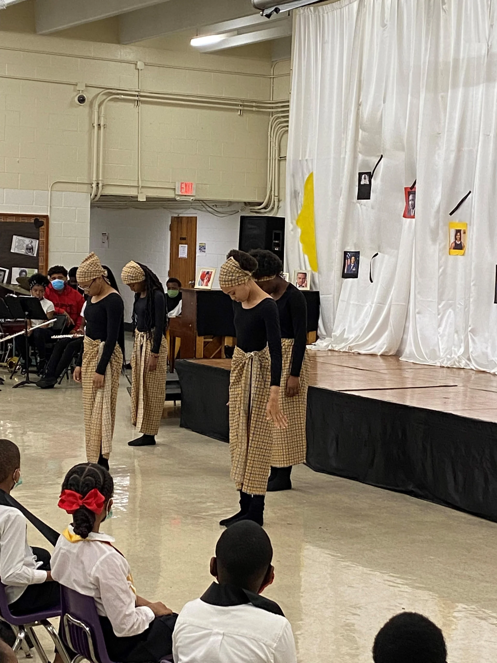 students dancing at assembly